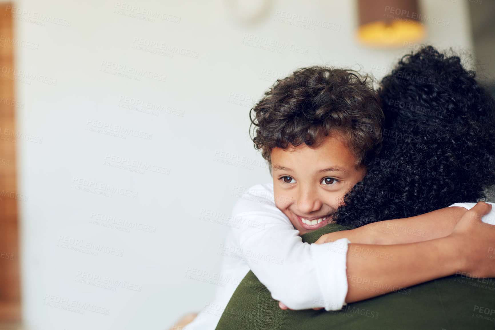 Buy stock photo Happy, boy and mother hugging in home with love, bonding and together for relationship with caring embrace. Relaxing, family and apartment for childcare or parent, affection and kid smiling in house