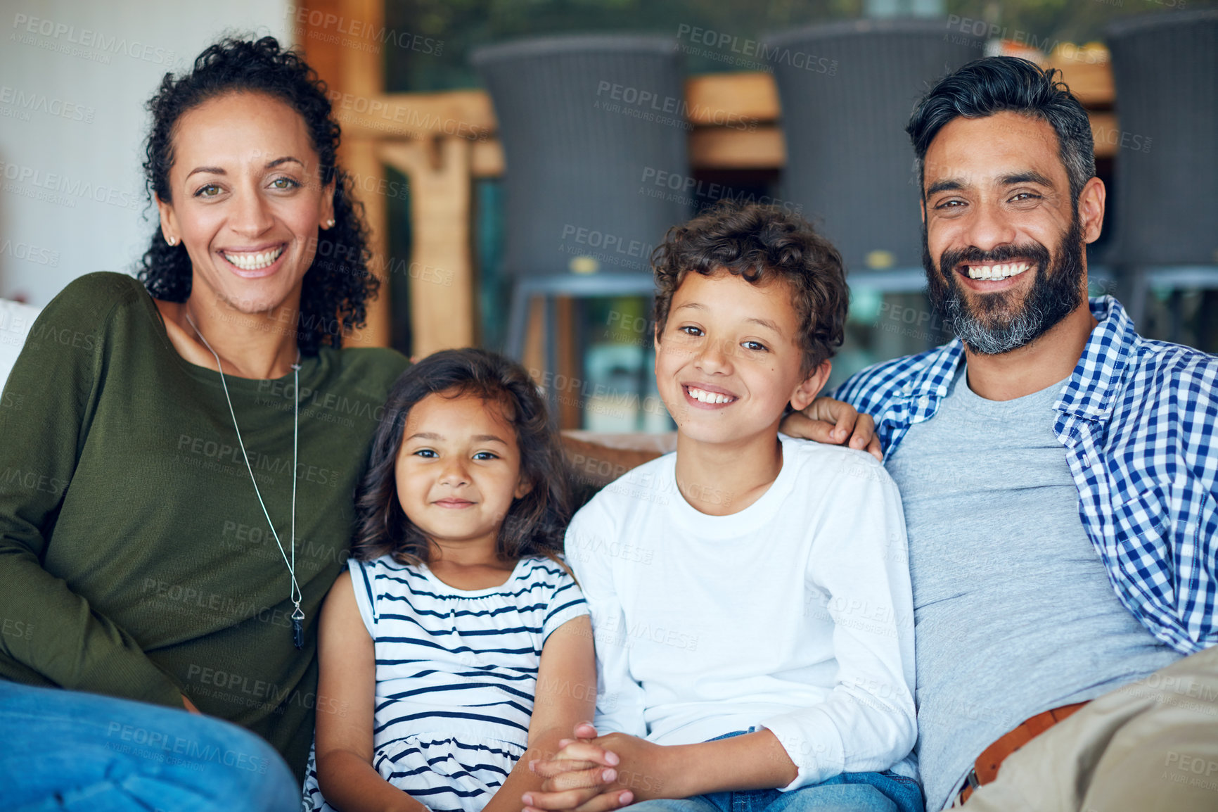 Buy stock photo Portrait of a happy family bonding together at home