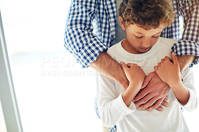 Buy stock photo Sad, depression and care of a father and son together for comfort, love and support at home. Depressed, empathy and anxiety or mental health problem of a boy child with a man for family compassion