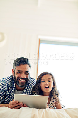 Buy stock photo Portrait, digital tablet and daughter with father on a bed for reading, story and learning in their home together. Family, face and parent and girl relax in bedroom online with ebook or subscription