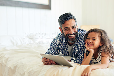 Buy stock photo Happy, portrait and digital tablet by girl with father on a bed, relax and browsing for entertainment in their home. Face, smile and parent and with child in bedroom online for streaming or reading
