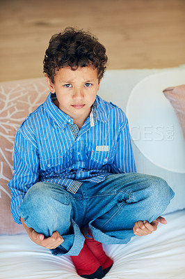 Buy stock photo Portrait of an upset little boy enduring a time out at home