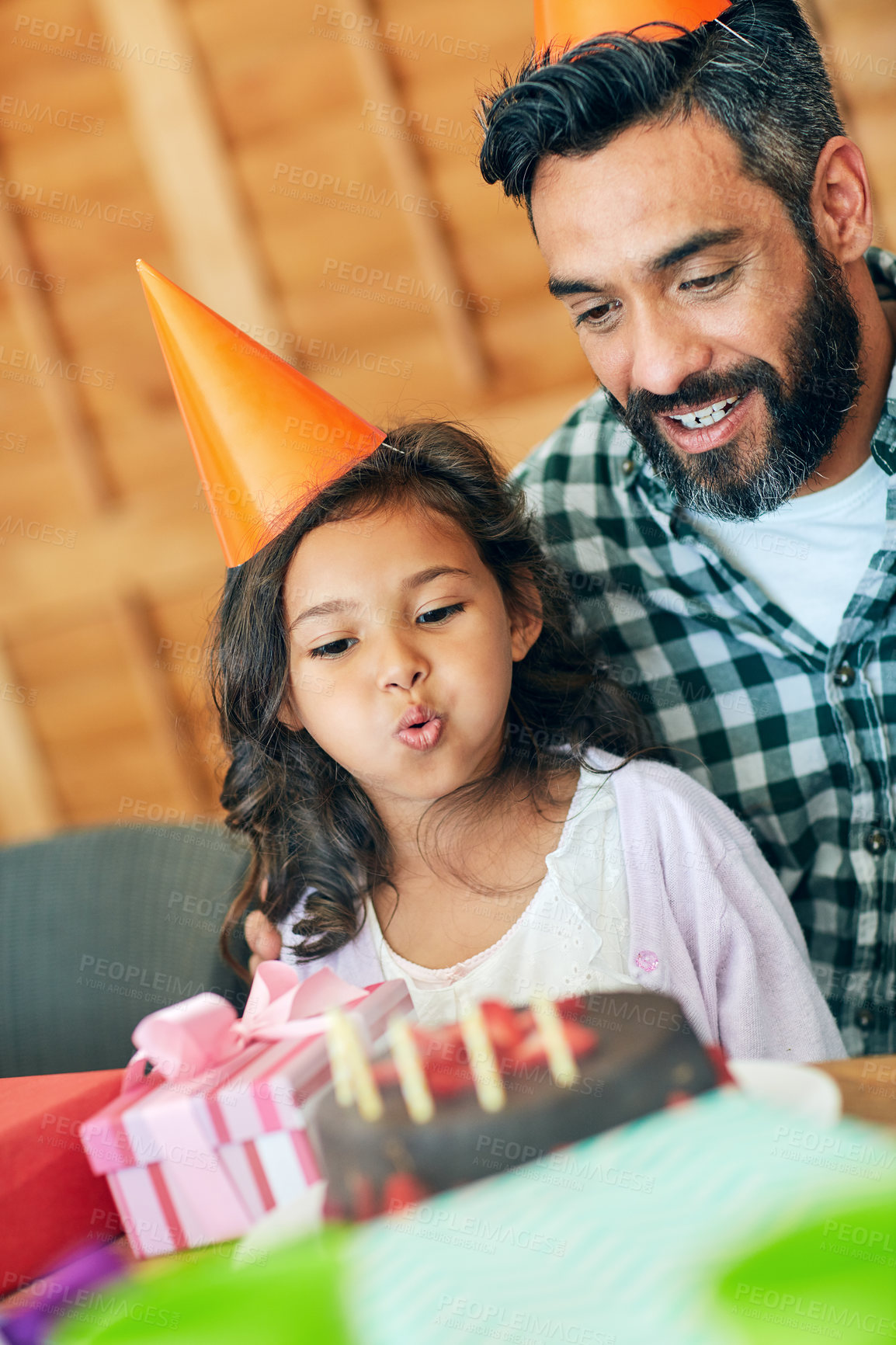 Buy stock photo Birthday, happy and dad with child with cake for surprise, celebration and decorations for event. Family, home and father with girl for candles, wish and blowing for bonding, party and celebrate