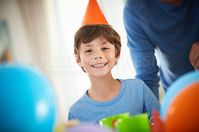 Buy stock photo Portrait of a happy little boy enjoying a birthday party at home