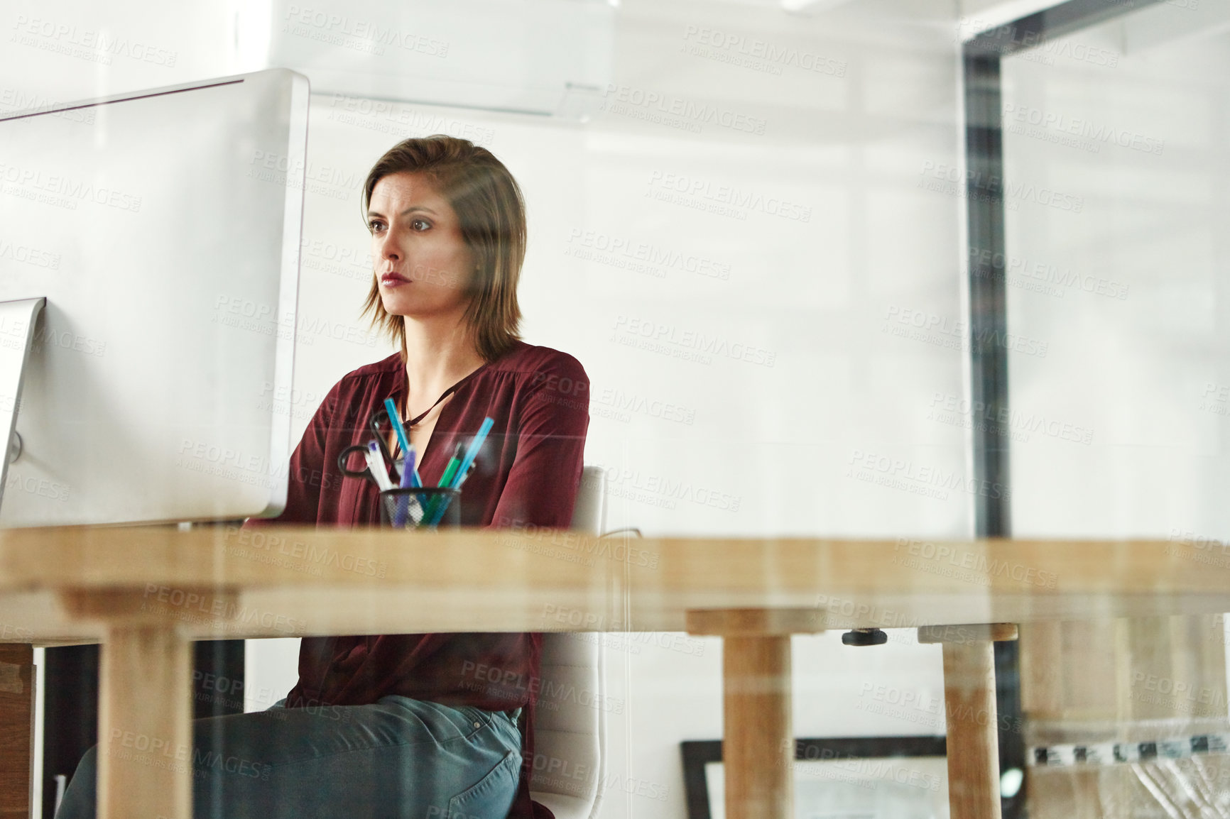 Buy stock photo Business, woman or serious at computer in office for app development, sample site testing or research. Web designer, person and tech at agency for debugging, programming and software update at desk