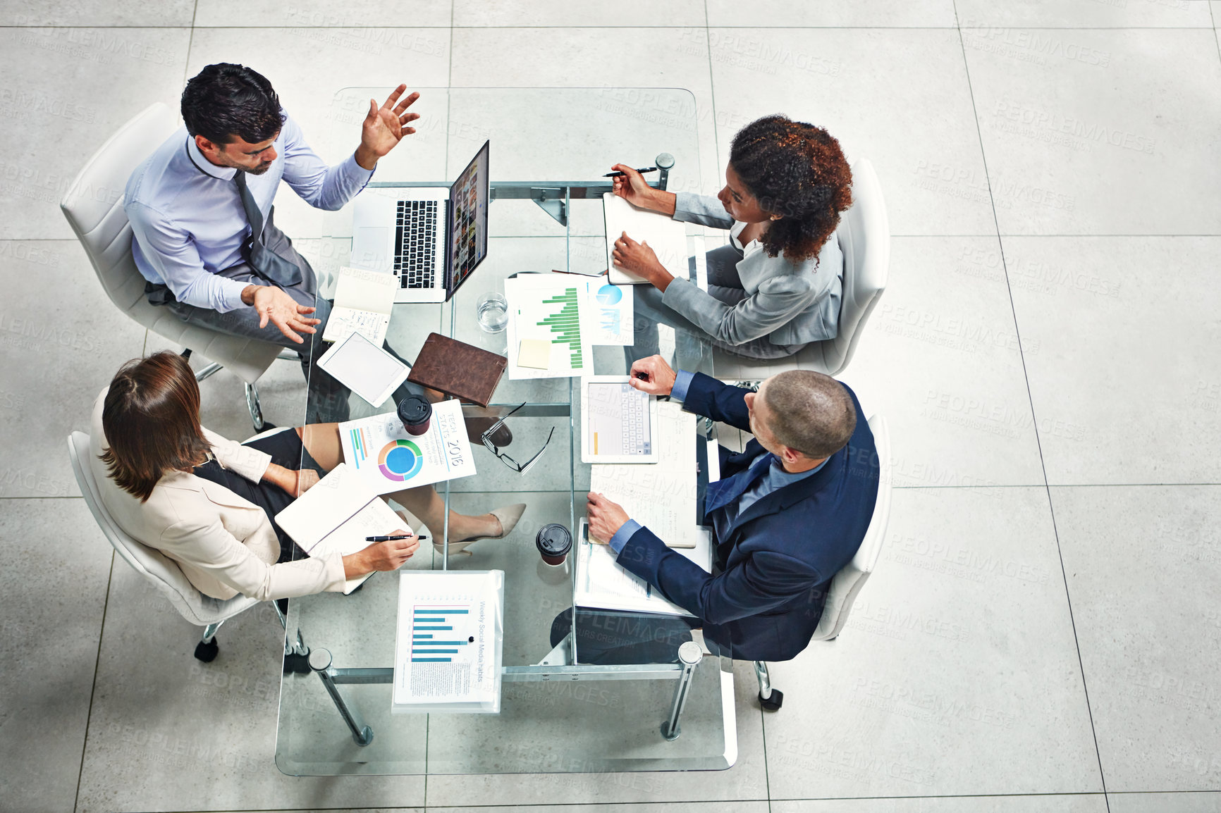 Buy stock photo Workshop, paperwork and business people in boardroom with laptop for planning, strategy and collaboration. Charts, graphs and teamwork in meeting for growth, development and data analysis from above