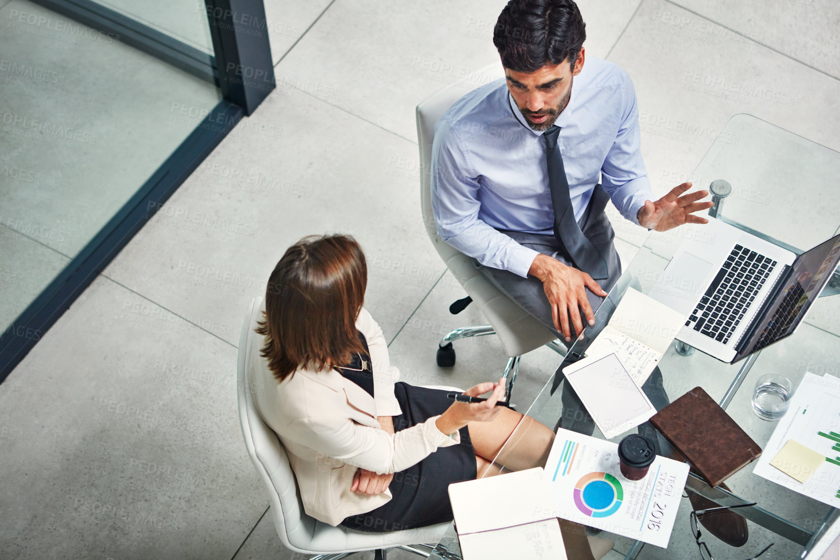 Buy stock photo Discussion, statistics and business people in office with laptop for planning, strategy and collaboration. Charts, graphs and teamwork in meeting for growth, development and data analysis from above