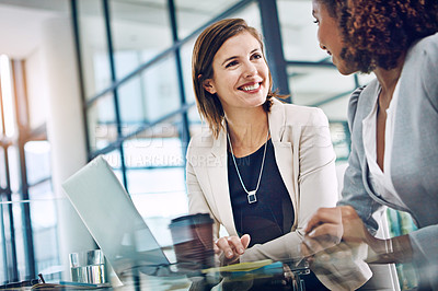 Buy stock photo Meeting, businesswomen brainstorming or talking and together in office at work. Teamwork or collaboration, friends or women coworkers and female colleagues discussion or talking at desk in workplace