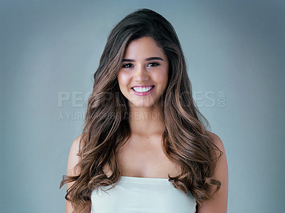 Buy stock photo Happy woman, portrait and beauty with makeup for cosmetics or skincare on a gray studio background. Attractive, young female person or brunette model with smile for facial, cosmetology or dermatology