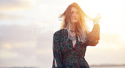 Buy stock photo Cropped shot of an attractive young woman spending the day outdoors