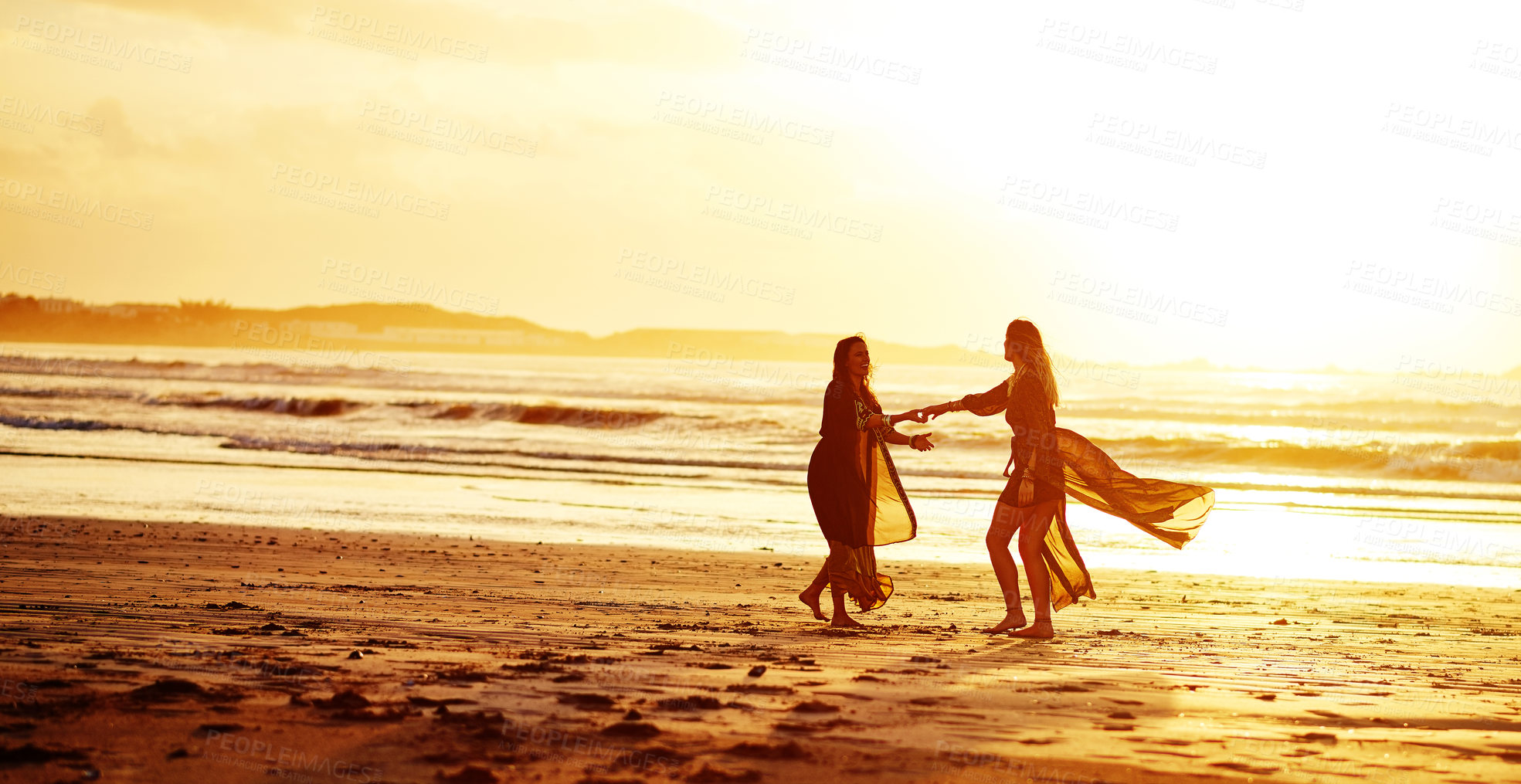 Buy stock photo Shot of young people together on the beach