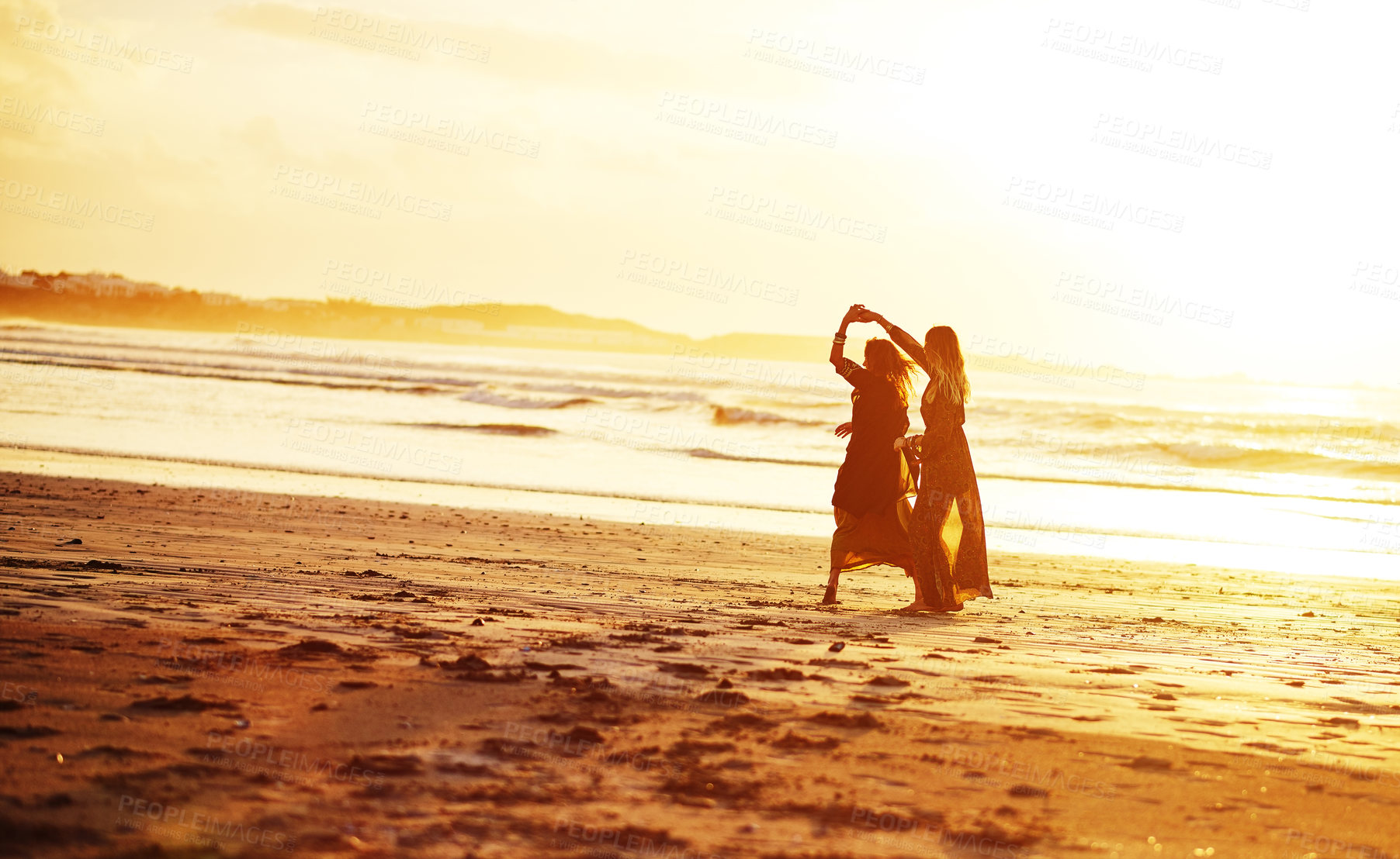 Buy stock photo Shot of young people together on the beach