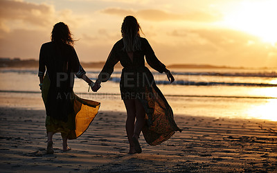 Buy stock photo Shot of young people together on the beach