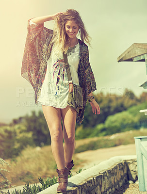 Buy stock photo Cropped shot of an attractive young woman enjoying a day in the summer