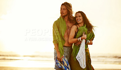 Buy stock photo Cropped shot of an affectionate couple standing on the beach