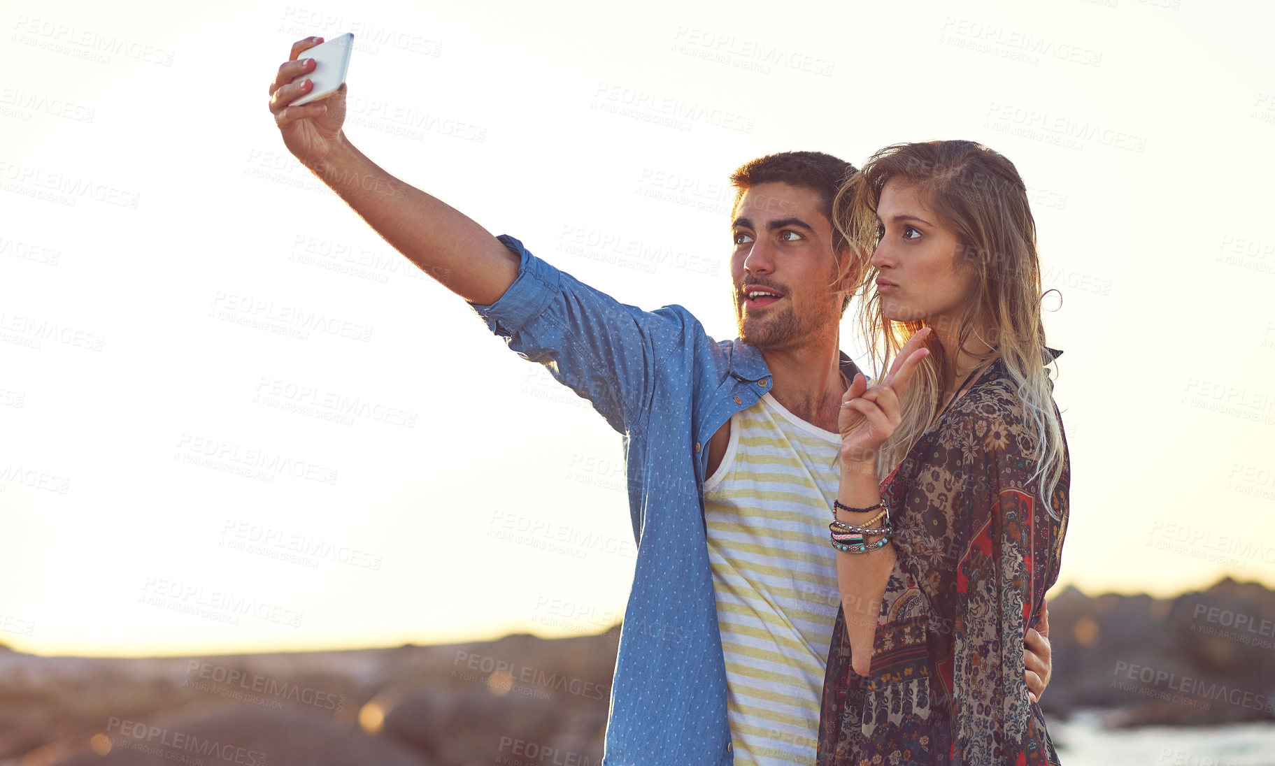 Buy stock photo Photography, outdoor or couple with selfie for vacation, social media post or capture moment for memory. Nature, space and people with profile picture update for holiday, peace sign and bonding trip