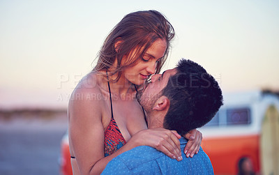 Buy stock photo Love, couple and kiss at the beach on date, vacation or road trip in summer with freedom, together and romantic adventure. People, dating and support in relationship, happiness or boyfriend and girl