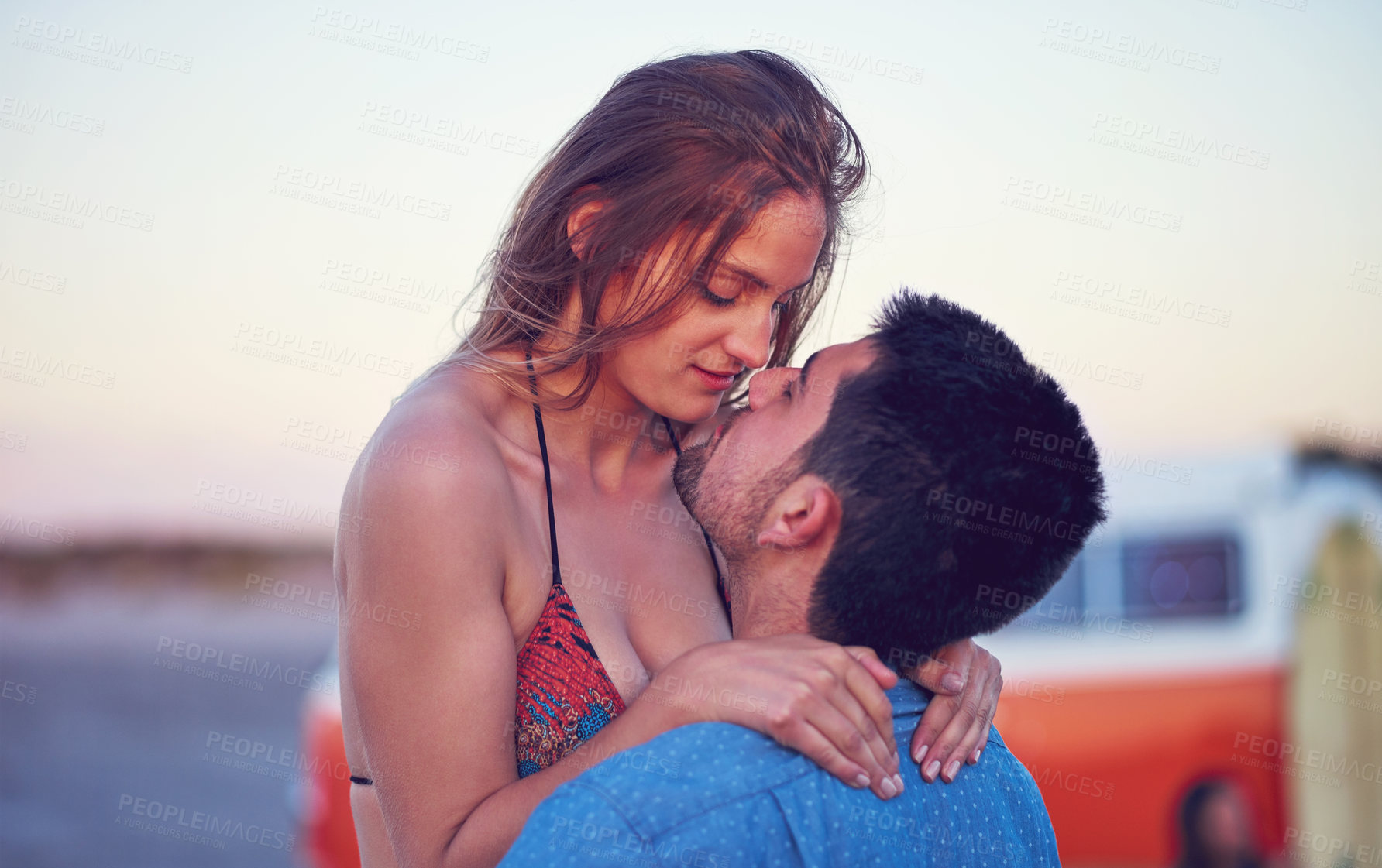 Buy stock photo Love, couple and kiss at the beach on date, vacation or road trip in summer with freedom, together and romantic adventure. People, dating and support in relationship, happiness or boyfriend and girl