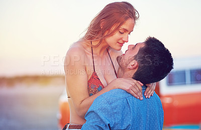 Buy stock photo Couple, love and hug at the beach on date, vacation or road trip in summer with partner, together and romantic adventure. People, dating and support in relationship, happiness or boyfriend and girl