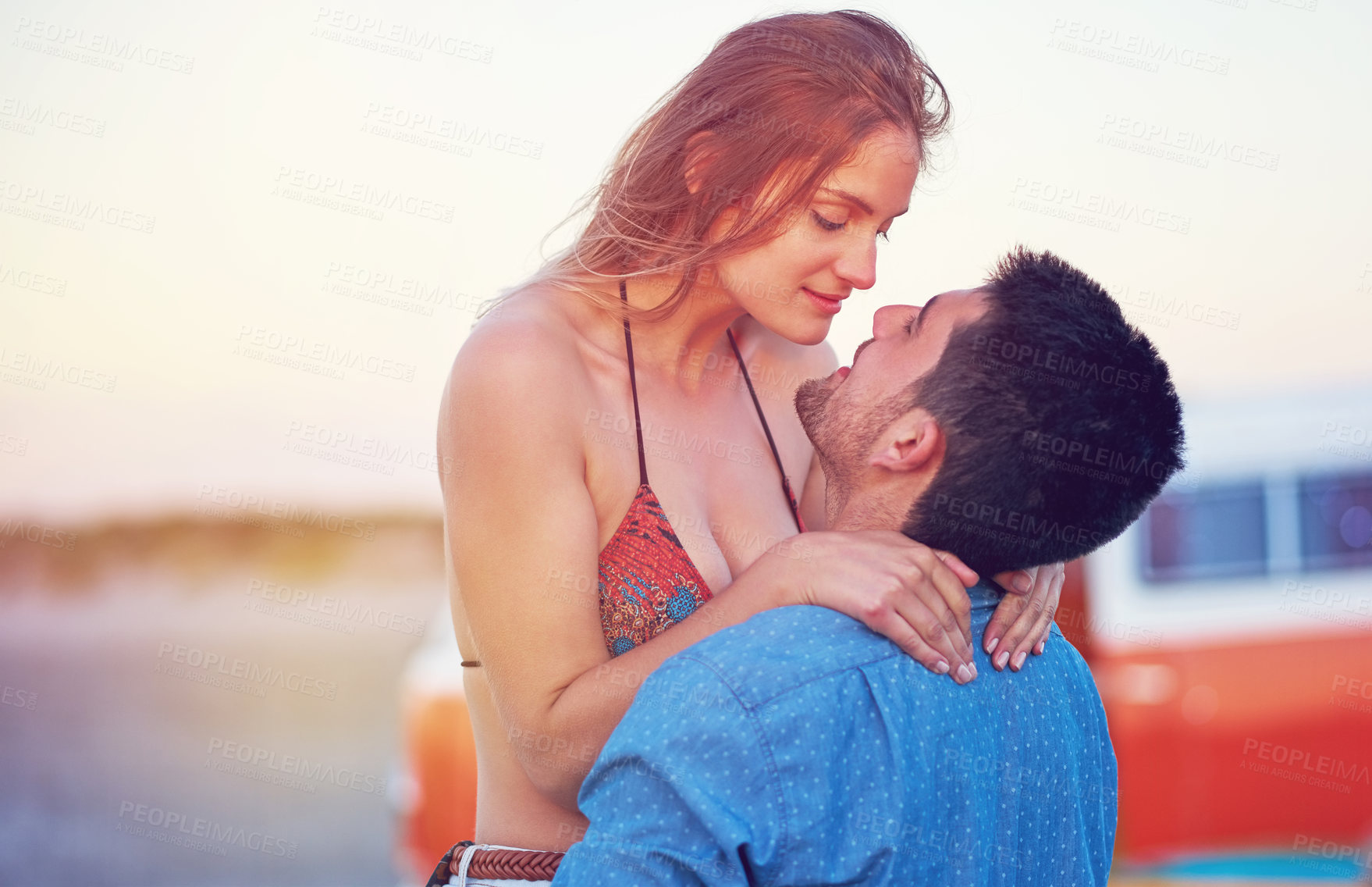 Buy stock photo Couple, love and hug at the beach on date, vacation or road trip in summer with partner, together and romantic adventure. People, dating and support in relationship, happiness or boyfriend and girl