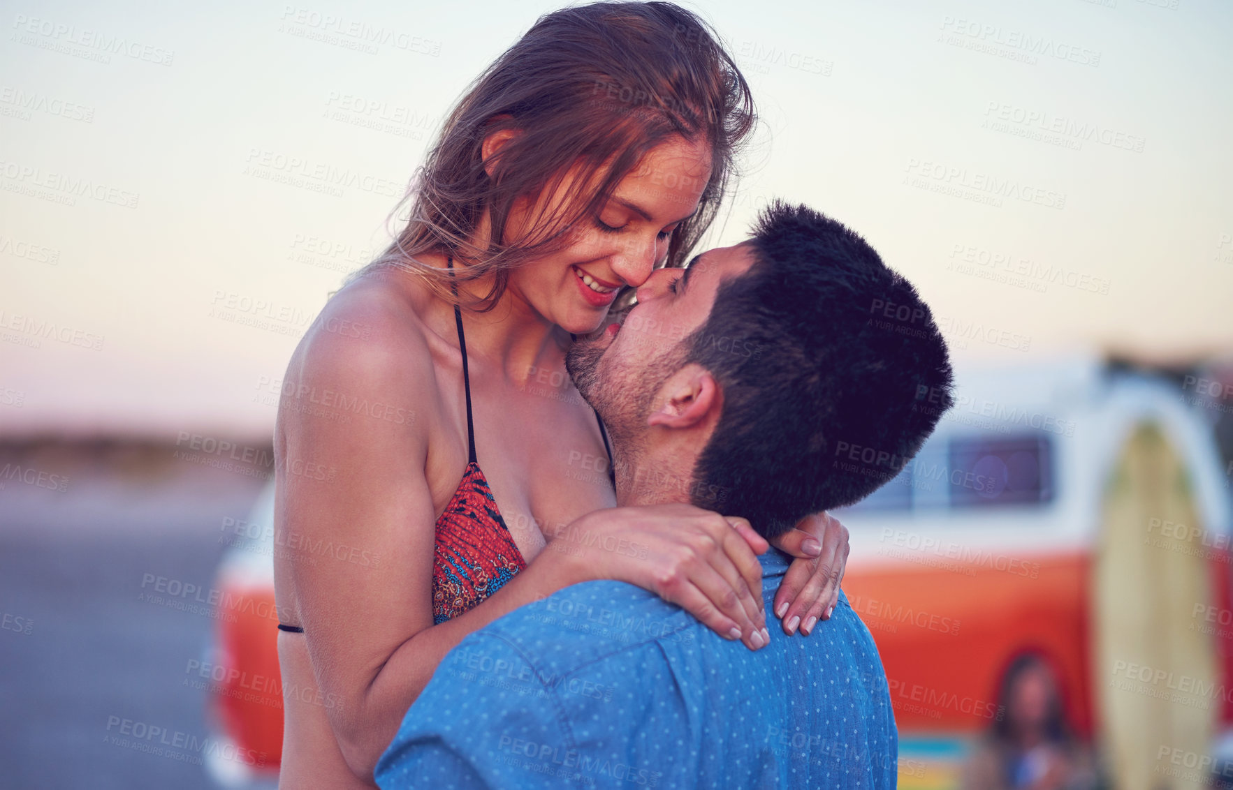 Buy stock photo Couple, love and kiss at the beach on date, vacation or road trip in summer at sunset, together and romantic adventure. People, happy and support in relationship, happiness or boyfriend and girl