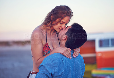 Buy stock photo Couple, kiss and love at the beach on date, vacation or road trip in summer with partner, together and romantic adventure. People, dating and support in relationship, happiness or boyfriend and girl