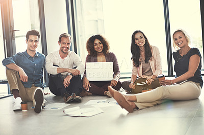 Buy stock photo Portrait of a team of designers brainstorming on the floor in an office