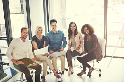 Buy stock photo Portrait of a team of designers brainstorming together in an office