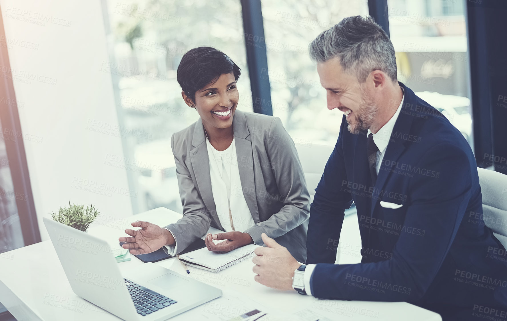 Buy stock photo Investor, conversation and business people in office, laptop or email notification for profit growth. Financial advisor, man or woman in meeting, pc or discussion for trading strategy or website info