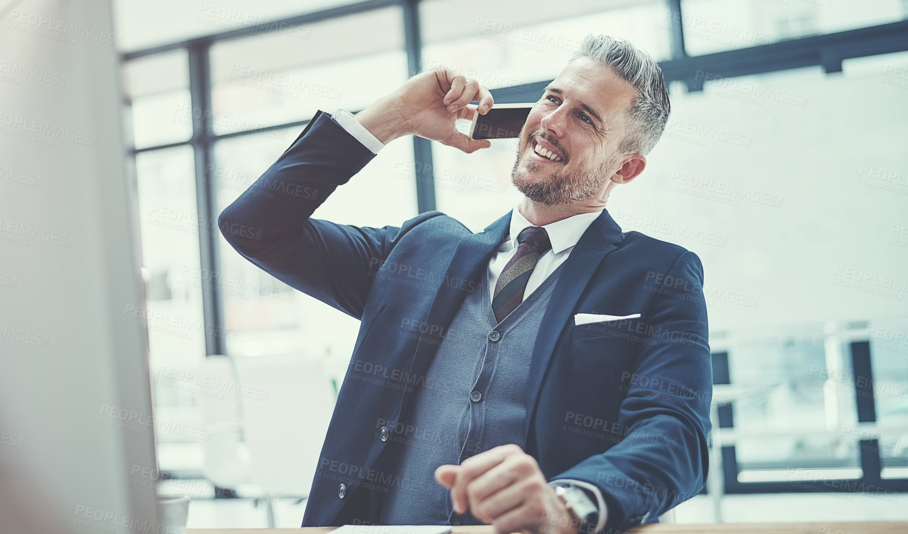 Buy stock photo Shot of corporate businesspeople working in their office