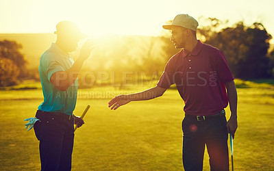 Buy stock photo Shot of two golfers about to shake hands on the golf course