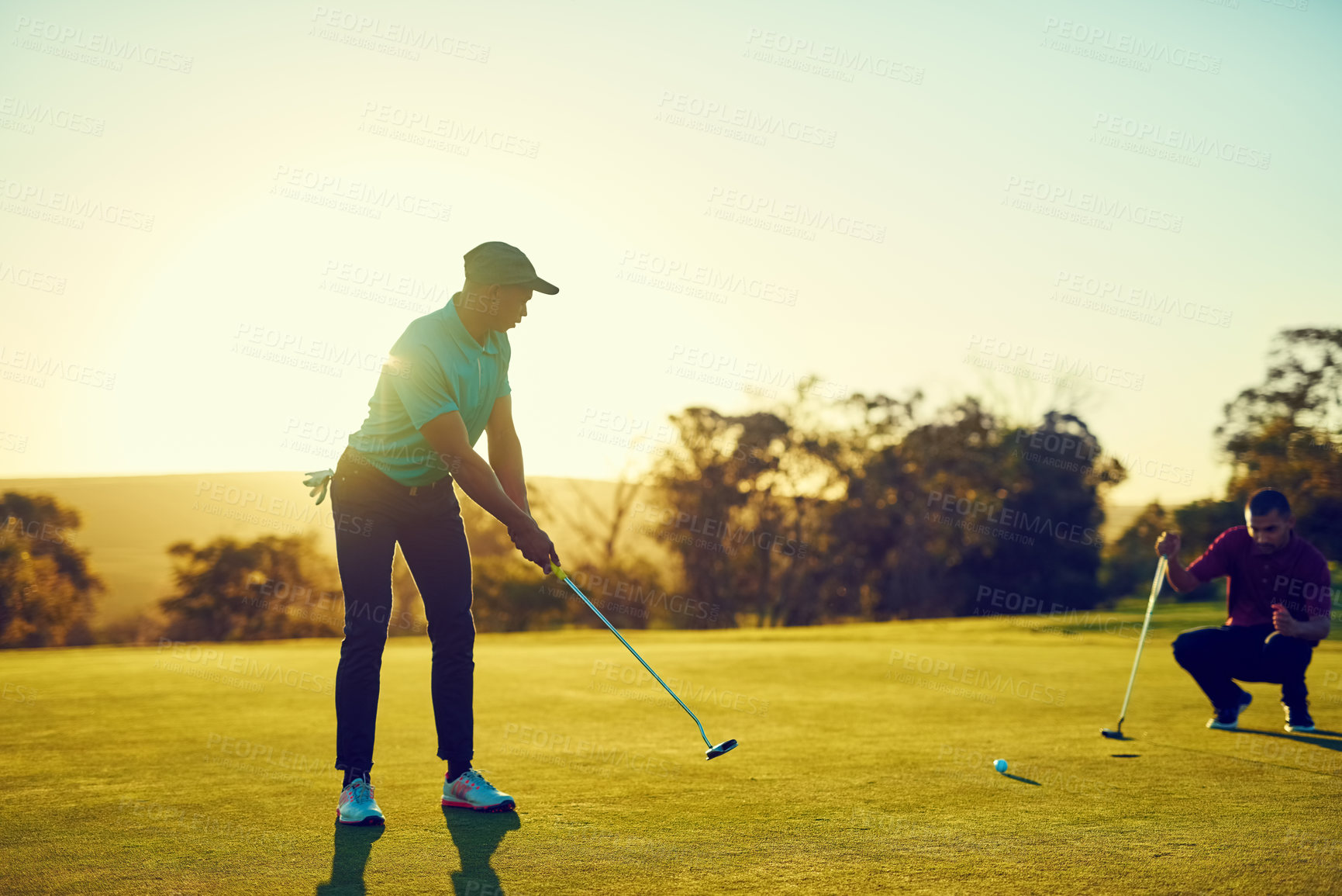 Buy stock photo Golf, sports and men outdoor to play on field for competition, game or hobby of friends by sky. Space, nature and male people with club stick and ball for aim, action or practice on course with flare