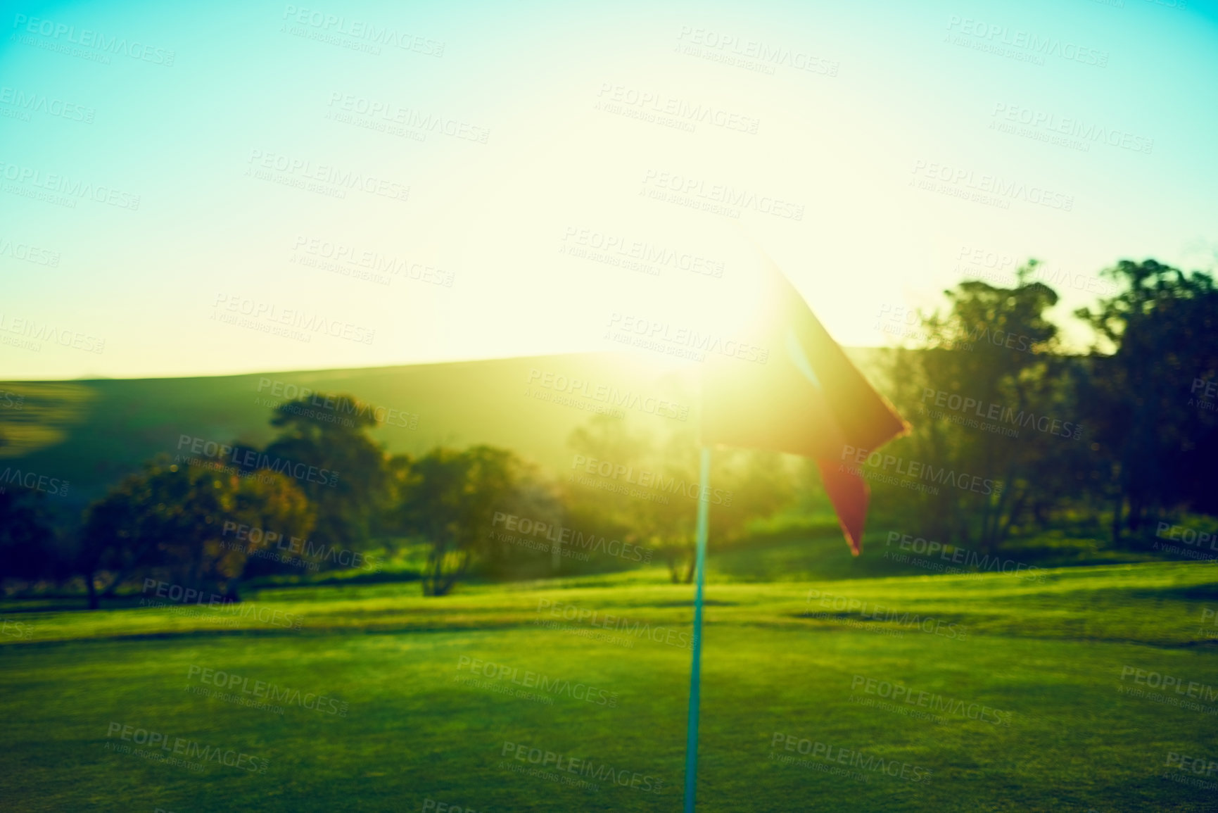 Buy stock photo Shot of a flag on a golf course