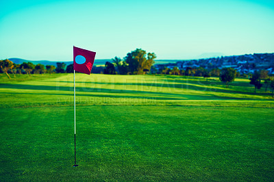 Buy stock photo Shot of a flag on a golf course