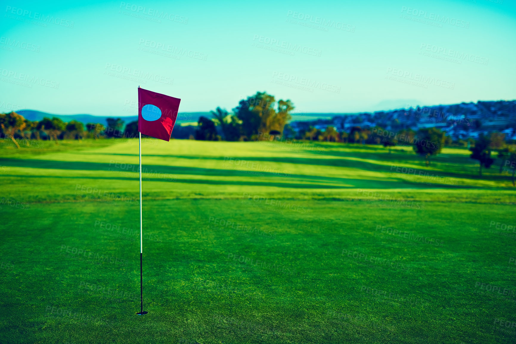 Buy stock photo Shot of a flag on a golf course