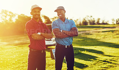 Buy stock photo Shot of two friends standing together on a golf course