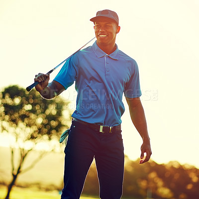 Buy stock photo Shot of a young man playing golf