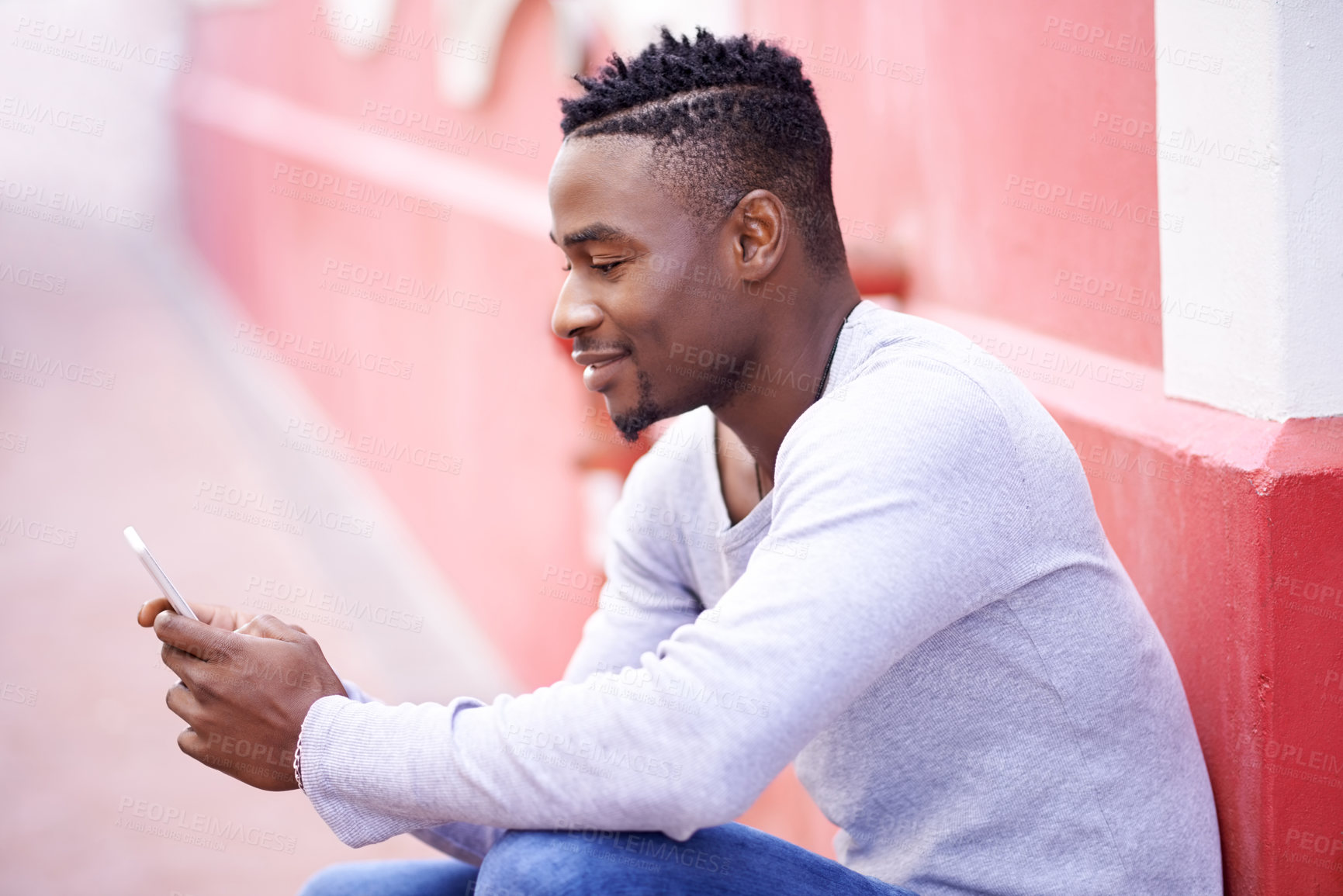 Buy stock photo Black man, cellphone and smile in city for social media, networking and communication in street. College student, mobile and research for university, typing and study online for exam in town