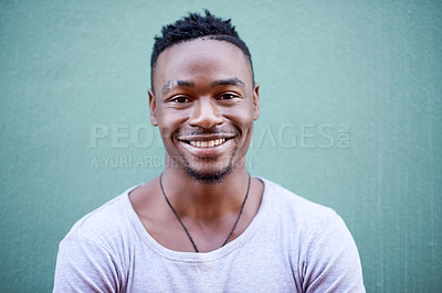 Buy stock photo Happy, black man and wall for portrait in outdoor with relaxed facial expression for hearing good news or results. Smile, African and male student with positive attitude from Kenya by blue background