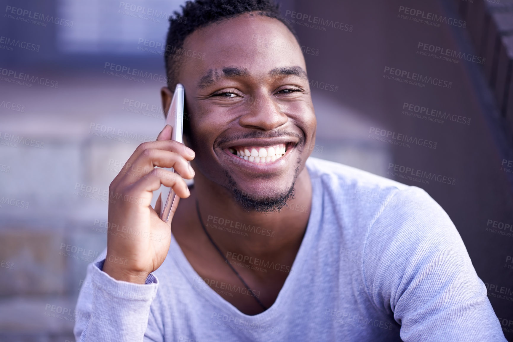 Buy stock photo Black man, phone call and portrait in city for talking, networking and happiness on stairs. Male college student, mobile and listen to joke for communication, laugh and relax with technology