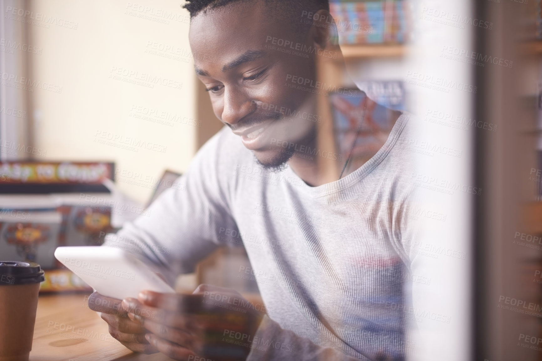 Buy stock photo Library, student and black man with tablet, reading and digital for research, study and web for project. Connection, university and guy in shop for books, internet and knowledge to learn in Atlanta