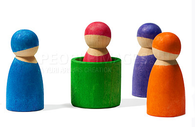 Buy stock photo Wood, figure and abstract on white background for community, diversity and teamwork with social group. Wooden icon, studio and friendship with connection, society or symbol people together with color