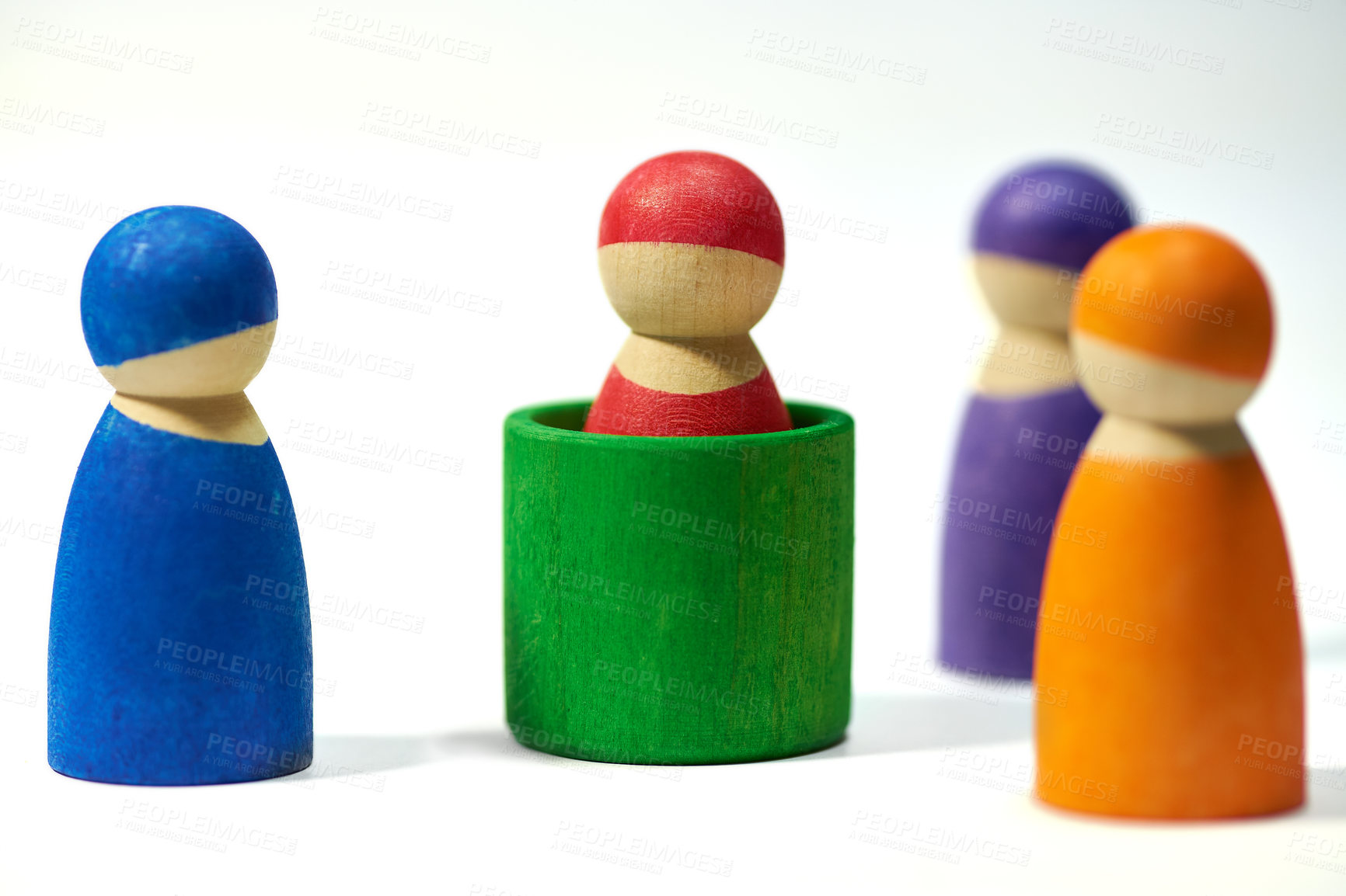 Buy stock photo Wood, figure and studio on white background for community, diversity and teamwork with social group. Wooden icon, symbol and friendship with connection, society or abstract people together with color
