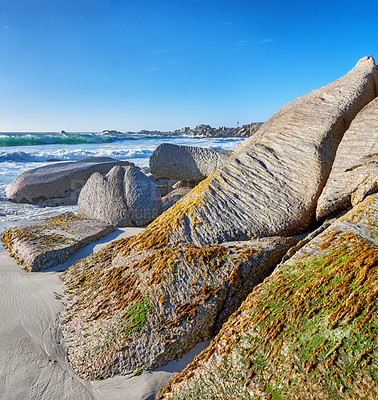 Buy stock photo Sky, tropical or beach with coast, rocks and destination with algae for travel location in nature. Outdoor, island ecology or ocean with scenic shore, rock erosion or stones with seaweed in Indonesia