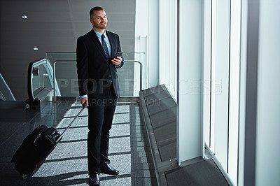 Buy stock photo Waiting, thinking or business man in airport with phone, luggage or suitcase for travel booking. Social media, entrepreneur or corporate worker thinking to chat on mobile app on international flight