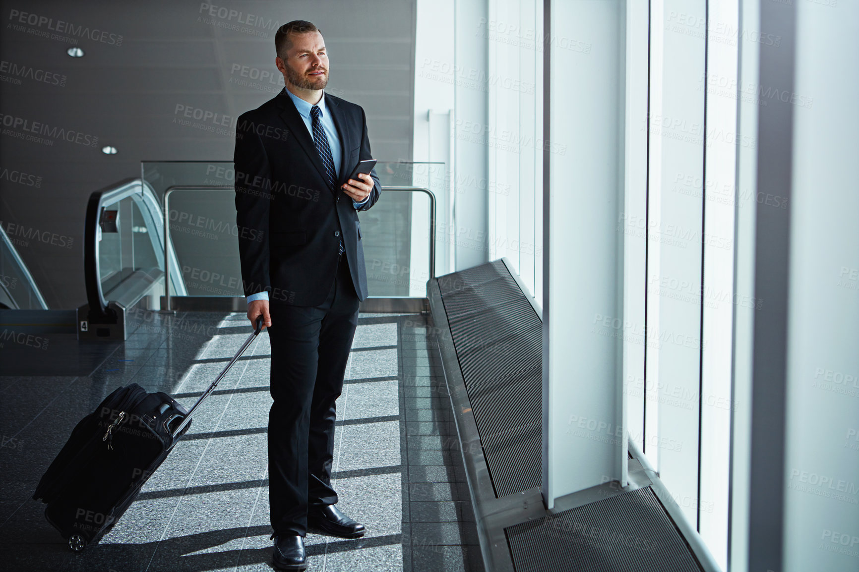 Buy stock photo Waiting, thinking or business man in airport with phone, luggage or suitcase for travel booking. Social media, entrepreneur or corporate worker thinking to chat on mobile app on international flight