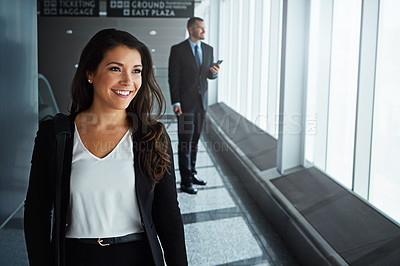 Buy stock photo Walking, thinking or happy woman in airport for business trip with smile for booking or commute. People, employee or corporate workers in lobby for holiday travel or journey on international flight 