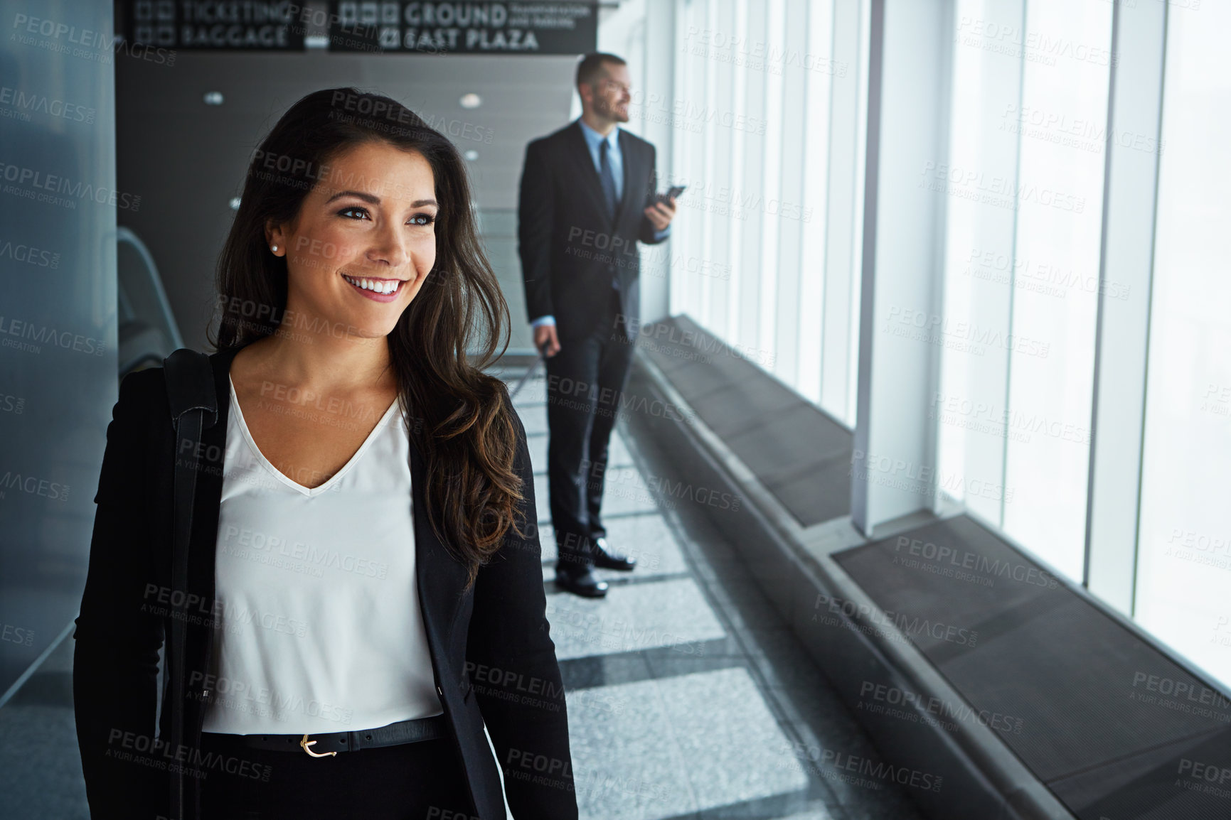 Buy stock photo Walking, thinking or happy woman in airport for business trip with smile for booking or commute. People, employee or corporate workers in lobby for holiday travel or journey on international flight 