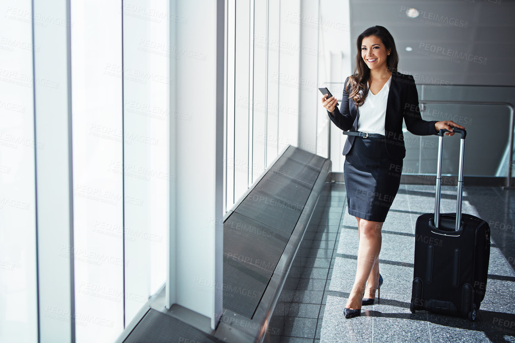 Buy stock photo Business woman, phone and bag by airport window with smile, thinking and vision for international travel. Entrepreneur, suitcase and smartphone with flight schedule for global immigration in London