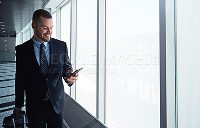 Buy stock photo Corporate man, phone and window in airport corridor for reading, thinking or communication on business travel. Entrepreneur, luggage and smartphone for flight schedule or global immigration in London